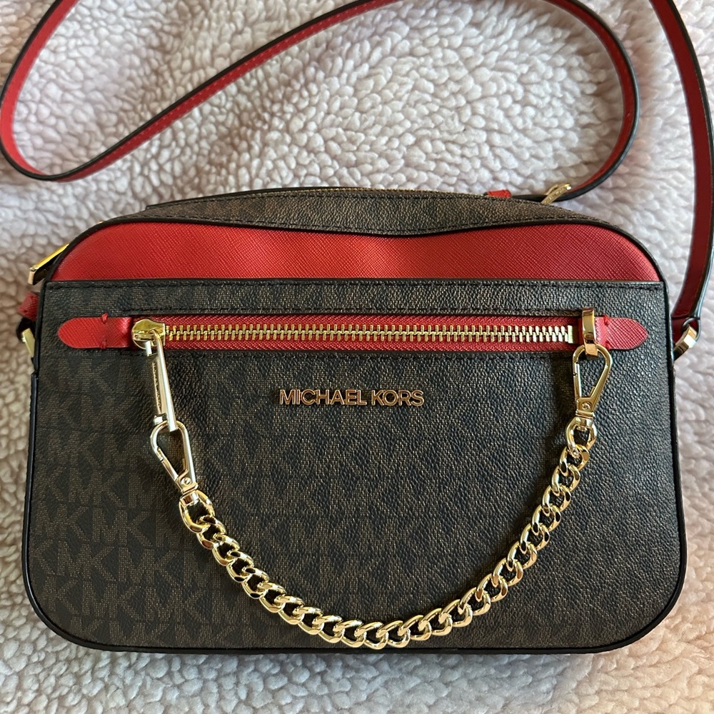 ON HOLD…Michael Kors large jet set logo shoulder bag.